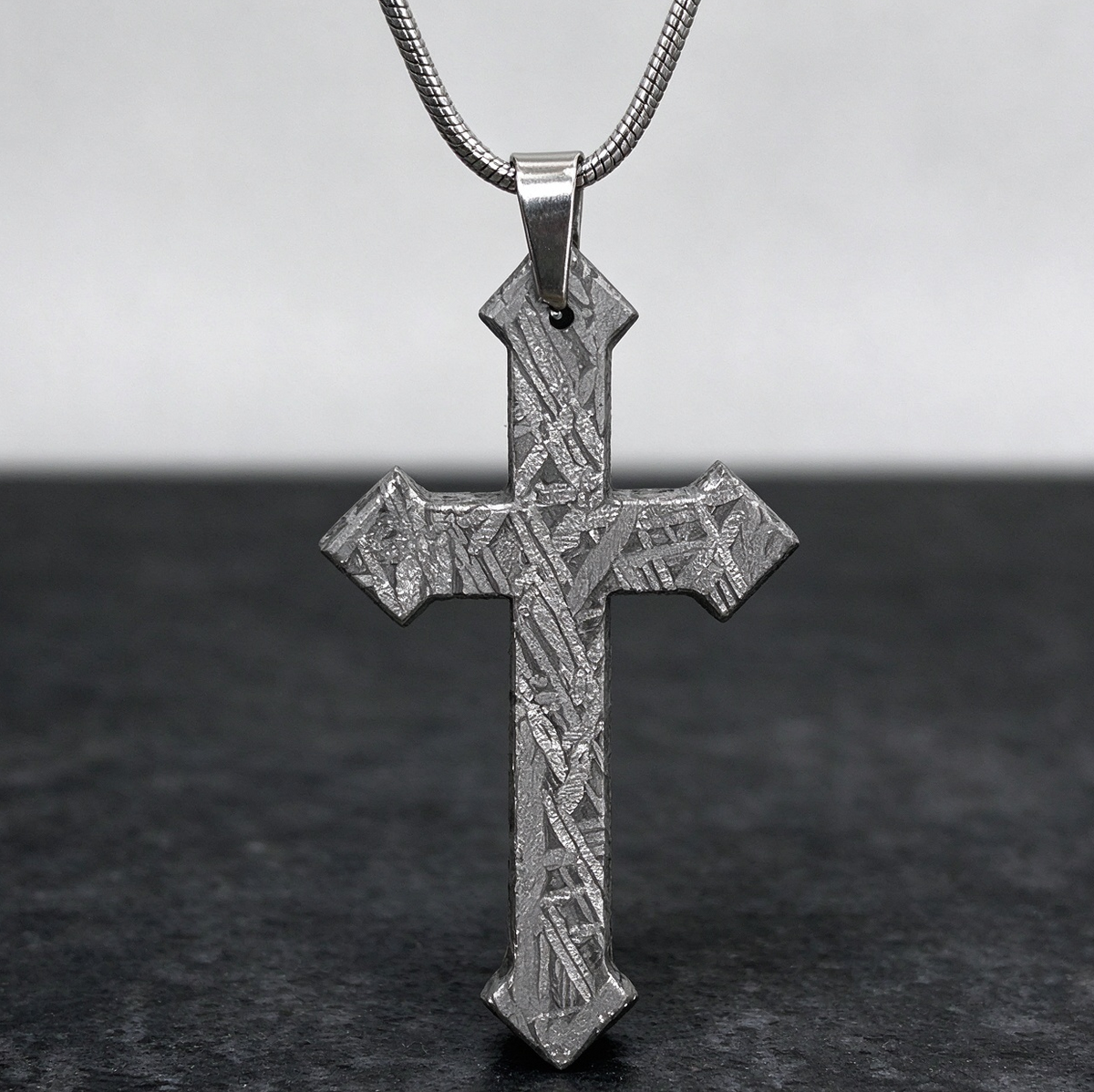 Muonionalusta meteorite pendant with naturally etched iron sample pattern