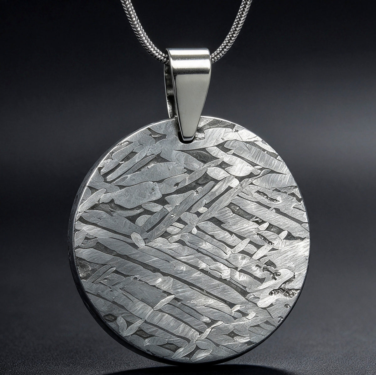 Muonionalusta meteorite pendant with naturally etched iron sample pattern