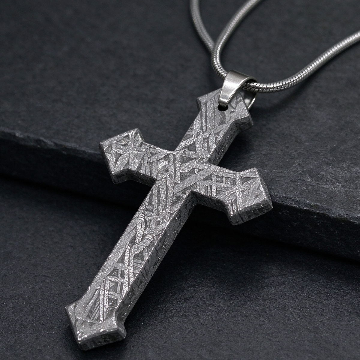 Muonionalusta meteorite pendant with naturally etched iron sample pattern