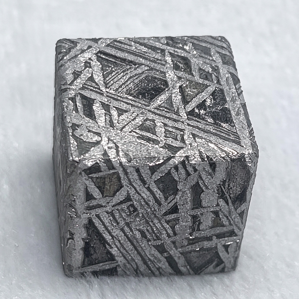 Mouoniolast meteorite block, hand carved, etched, Weidman pattern (20mm)